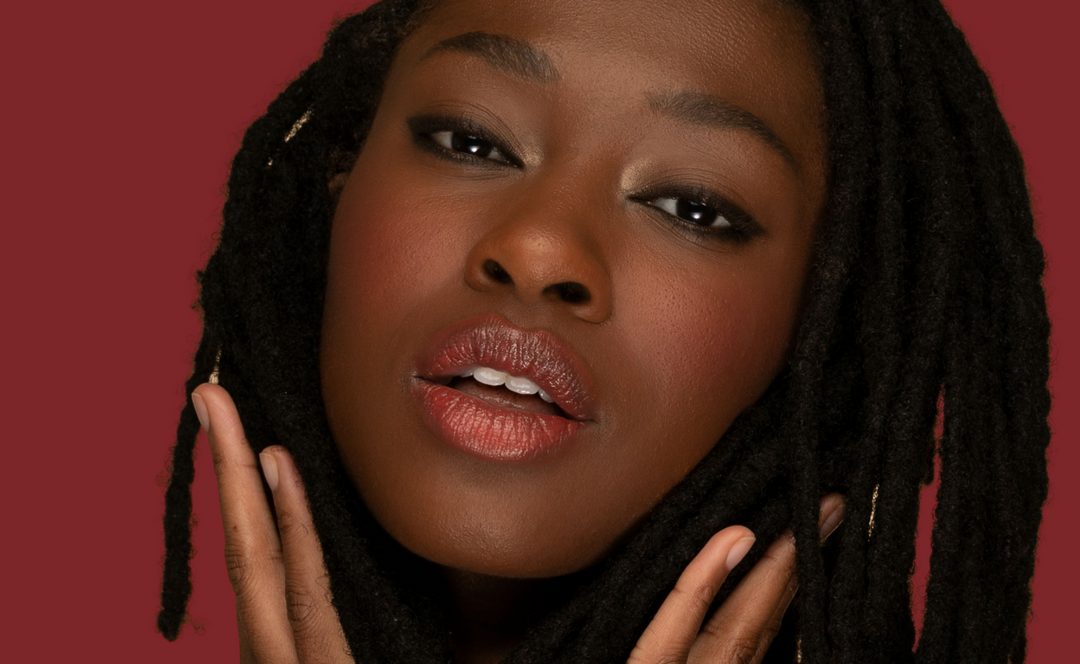 Black Woman Wearing Bésame Cosmetics Valentine's Day Inspired Makeup